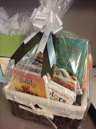 Baby shower has always been a special occasion and fun. Baby S First Library Gift Basket Baby Shower Gift Basket Book Gift Basket Baby Shower Baskets