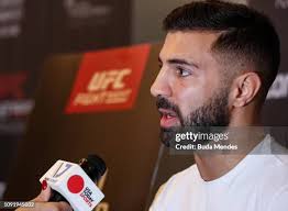 Opponents Johnny Walker of Brazil and Justin Ledet of the United... News  Photo