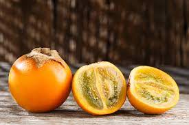 Foto De Fruto De Lulo Ou Naranjilla Na Madeira E Mais Fotos De Stock De Agricultura Istock