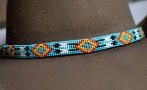 Our Southwest Inspired Beaded Hat Band Features An Aztec Design And Horsehair Tails Descri Beaded Hat Band Patterns Beaded Hat Bands Bracelets Handmade Beaded