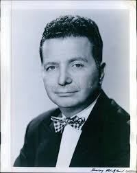 Who are the individuals in the photo with Groucho and Phil Silvers?