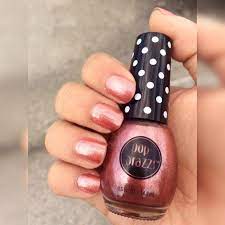 The polishes come in the standard glass bottle with a plastic cap that is decorated with little polka dots. Poparazzi Nail Polish For Ladies Bronze Metal Sp2418 Brandsego Com