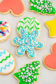 Collage of 4 cookie icing recipes. Easy Sugar Cookie Icing Live Well Bake Often