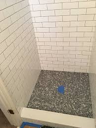 Such finish looks good and classy, it never goes outdated and, what's really important, it's durable and provides much more protection and enables easy cleaning. How To Tile The First Two Rows Of A Shower Bathroom Repair Tutor
