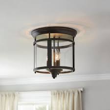 Its oil rubbed bronze finish pairing with the metal cage showcases a cool vintage look. Home Decorators Collection 3 Light Bronze 12 25 In Flush Mount Ceiling Light 21094 001 The Home Depot Flush Mount Ceiling Lights Ceiling Lights Flush Mount Ceiling