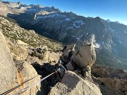 John Wester making a rappel somewhere along the ridge
