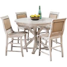 White dining room lined with a distressed column that's attached to the ornate ceiling and dark wood plank flooring. Willow 5 Piece Round Counter Set Dining Slumberland