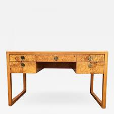 Has one drawer and bowed legs. 1970s Modern Burlwood Writing Desk