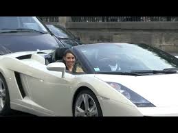 Both the body panels and the interior of the car are covered with white fur. Exclusive Kim Kardashian And Kanye West Rent A White Lamborghini For A Crazy Ride In Paris Youtube