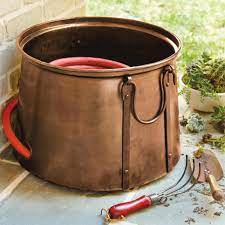 Consider one of these eight decorative hose management solutions. 17 Garden Hose Storage Solutions Hgtv