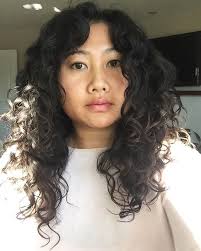 When washing your hair, get a conditioner and shampoo that carries keratin. Long Soft Naturally Curly Hair Hair Photo Long Hair Styles Curly Hair Styles Naturally