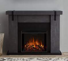 This beau model is perfect when transforming any room into a warm and cozy getaway. Real Flame 48 5 Aspen Electric Fireplace Pottery Barn