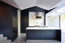 Accent pillows are in a darker navy blue and the bed skirt follows suit. Beautiful Blue Kitchen Design Ideas