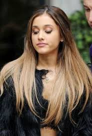 See the singer's bubble ponytail and hair bow. Ariana Grande Hairstyles