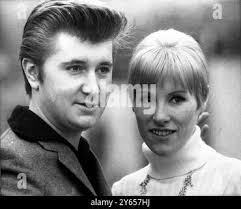 Italian singer Bobby Solo (left , who with Iva Zanicchi ), won the 19th San  Remo Song festival , pictured here with his wife Sophie Teckel 2 February  1969 Stock Photo