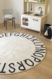 lorena canals rond vloerkleed abc natural gratis verzending playroom rug kids playroom basement decor