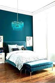 Stunning bed in a room with a lovely purple accent wall! Bedroom Design Teal House Decor Interior