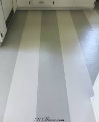 Take a peek at her kitchen floor before painting…quite an improvement over the state of the kitchen floor before painting! Update How My Painted Kitchen Floors Are Holding Up 1915 House