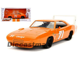 Brand new 1:24 scale diecast model car of 1969 dodge charger daytona red fast & furious 7 1969 dodge charger daytona and 1974 ford escort rs 2000 mkl the fast and the furious movie set of 2 pieces 1/43 diecast model cars by greenlight. Jada 1969 Dodge Charger Daytona Orange Bigtime Muscle 1 24 Contemporary Manufacture Diecast Toy Vehicles