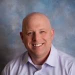 Dr. Christopher W. Baker, MD