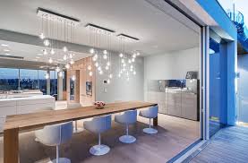 This is an example of a scandinavian open plan dining in brisbane with white walls, concrete floors and brown floor. Bocci Led Pendant Lights 14 Series In Dining Room Contemporary Dining Room Sydney By Golights Houzz