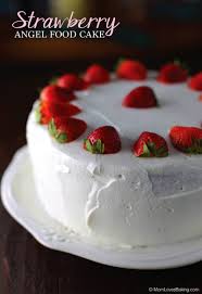 Working quickly, as the surface will set and crust quite quickly, spread the frosting over the cake using a palette knife, swirling the surface to texture it. Strawberry Angel Food Cake Mom Loves Baking