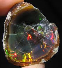 Black Opal Black Opal S Magical Properties Are Based In The Stone S Absorption Of All Colors The Stone S Exte Minerals And Gemstones Crystals Mineral Stone