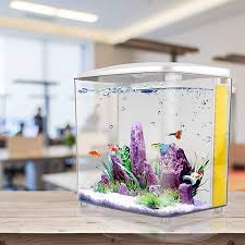 Small Salt Water Aquarium There Is A Complete Filtration System For Mini Fish Tank And Is Hidden Well Behi In 2020 Betta Aquarium Aquarium Fish Tank Saltwater Aquarium