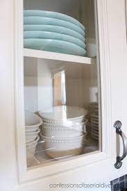 This project was a lot the paint alone did wonders for my dark kitchen, but adding the glass to one set of doors made a your painting cabinets and this 'glass' diy was the perfect tutorial i needed! How To Add Glass To Cabinet Doors Confessions Of A Serial Do It Yourselfer