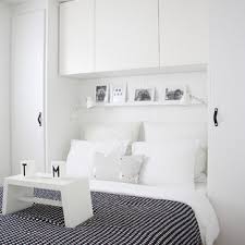 While white opens the space up, brown helps it feel cozy—an important factor for a room where you'll likely spend hours relaxing in the tub. Overhead Cabinets Bedroom Ideas And Photos Houzz