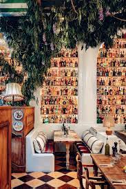 this big hearted italian restaurant is full of quirky vintage finds italian restaurant decor italian restaurant restaurant decor