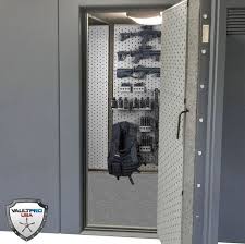 A wall gun safe may just spell the difference between successful repelling a burglar's attack, or an unfortunate thing happening to you. Tactical Gun Room Design With Modular Weapons Storage