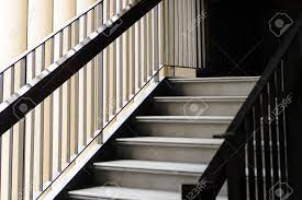 It's a set of 5 steps with a 24″ landing on top. Empty Modern Concrete Staircase And Black Steel Handrail With Stock Photo Picture And Royalty Free Image Image 110239514