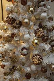 In need of some christmas tree inspo? Vintage Inspired Gold Ornaments In A Faux White Tree Gold Christmas Tree White Christmas Trees White Xmas Tree