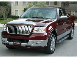 Image result for Dark Toreador Red 2006 Lincoln