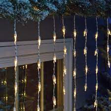 Heat the individual light strands for a few seconds with a hair dryer on low heat in order to warm the wires. Amazon Com Philips 105 Icicle Lights Led Extra Long Hang Straight Warm White Garden Outdoor