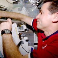 U.S. Navy Lt. Cmdr. David Bacon, center, and Lt. Joseph