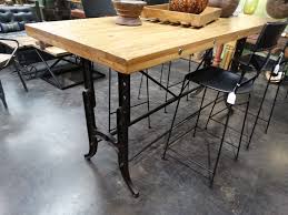 Industrial bench, coffee table, dining, bar, and counter height table bases for your own unique design. Wood Dining Table Features A Wood Top And A Black Metal Base