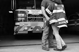 Black And White Fire Truck Firehouse Engagement Shoot Black And White Fire Truck In Background Firefighter Engagement Firefighter Engagement Pictures Engagement Pictures