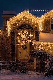Add to your paper snowflake decorations with these snowflake crafts. Christmas Decorating With Lighted Snowflakes Christmas Lights Etc Blog Christmas Lights Outside Snowflake Christmas Lights Christmas Lights
