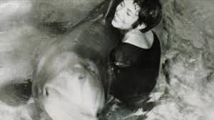 Hot babe uses dolphin on tight wet pussy - sizzling scenes with aquatic-themed vibrator