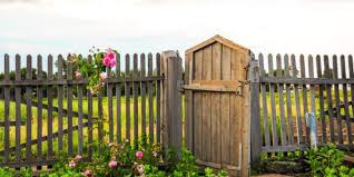 A small wooden fence gate that can be locked with a gate lock. 25 Unique Fence Gate Ideas For 2021 Organize With Sandy