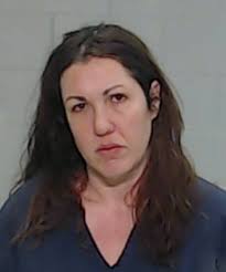 Woman arrested after punching, spitting at OPD officer