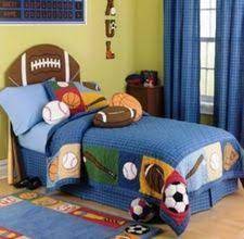 From cool beds and bedding sets to stylish furniture, functional desks, fun wall designs, and creative shelving, you'll learn how to decorate a boy's room with awesome styling. Sports Theme Bedroom Ideas For Boys Ehow Com Sports Themed Bedroom Bedroom Themes Sport Bedroom