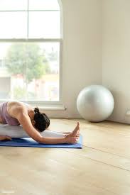 Download Premium Image Of Fitness Woman In A Janu Sirsasana Pose 2194504 Poses Savasana Pose Curvy Yogi