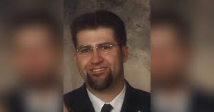 Obituary for Christopher K. Woolf