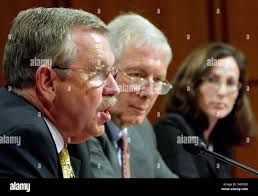 Security experts David Kay, Charles Boyd and Amy Zegart, left to right,  testify before the Senate Select Intelligence Committee about intelligence  reforms recommended by the 9/11 Commission