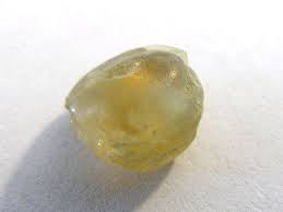 An Uncut Rough Yellow Sapphire Found At The Spokane Sapphire Mine Near Helena Rocks And Gems Fancy Sapphire Stone