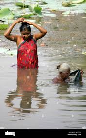 Women bathing bolgarh village orissa hi-res stock photography and images -  Alamy