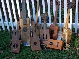 Pine sides, guibourtia neck through and ebony fingerboard. How To Build A Cigar Box Guitar Your Projects Obn
